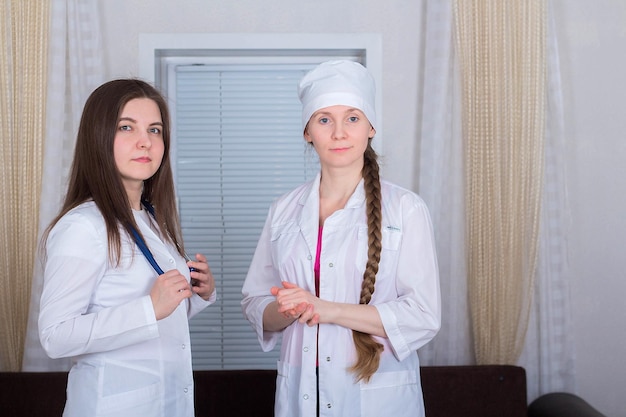 Two female doctors or nurses