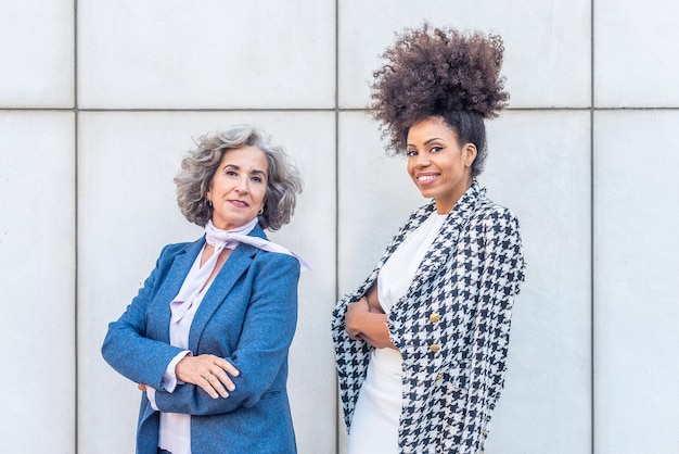 Two female entrepreneurs posing for the camera