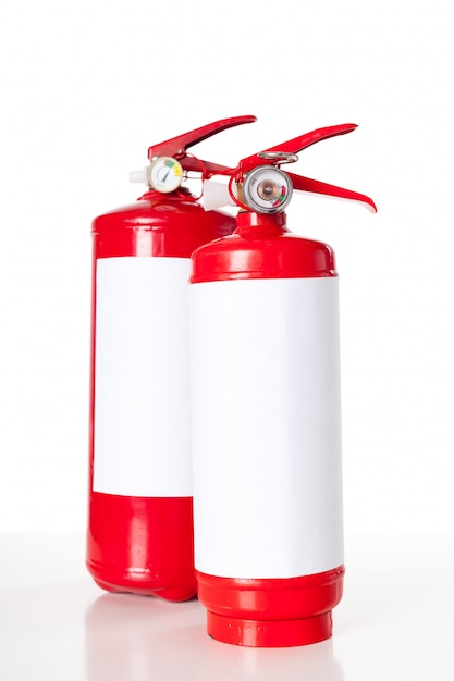 Two fire extinguisher isolated on white 