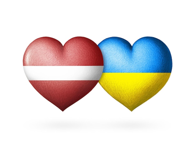 Two flags Flags of Ukraine and Latvia Two hearts in the colors of the flags