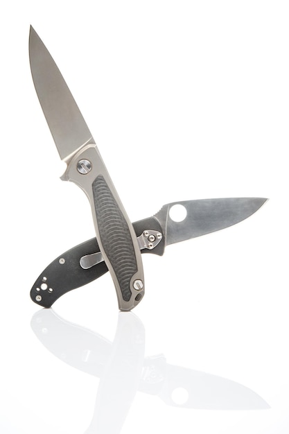 two folding knives on a white background item for tourism and survival