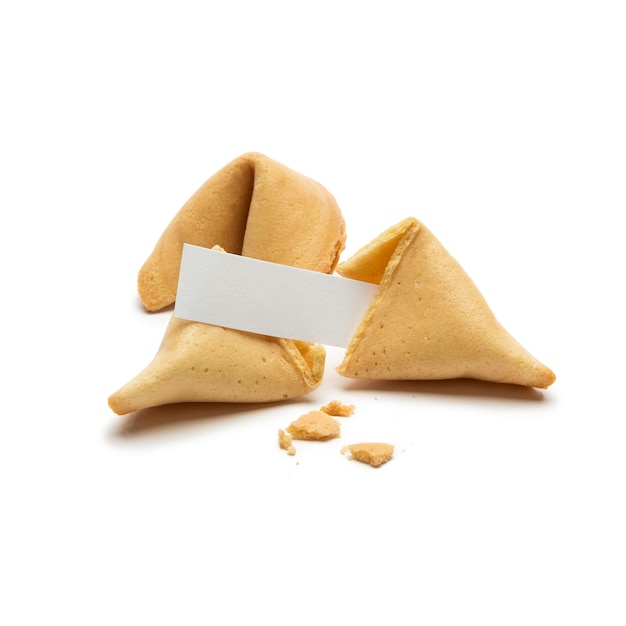 Photo two fortune cookies with note isolated on white background. taken in studio with a 5d mark iii.