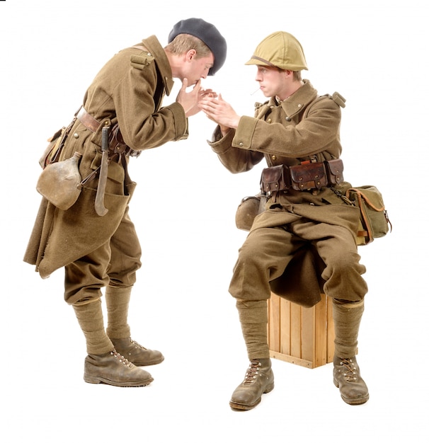 Two French soldiers 1940s smoke a cigarette