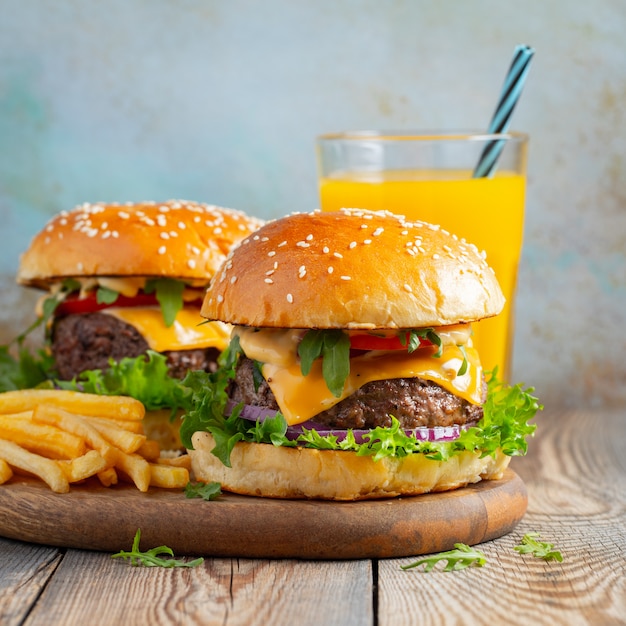 Two fresh homemade burgers.