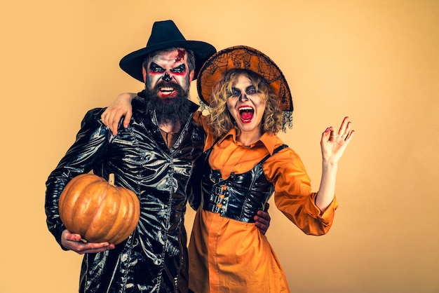 Two friends at a halloween party halloween party and holiday concept