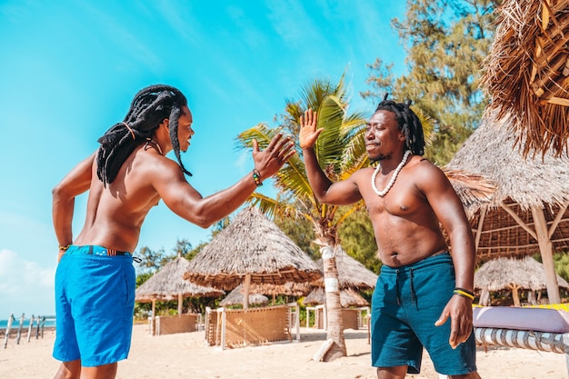 Two friends meet and greet each other at sea