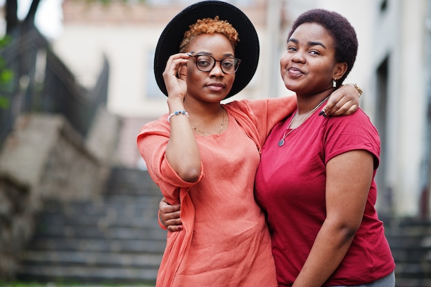 Two friends posing outdoors