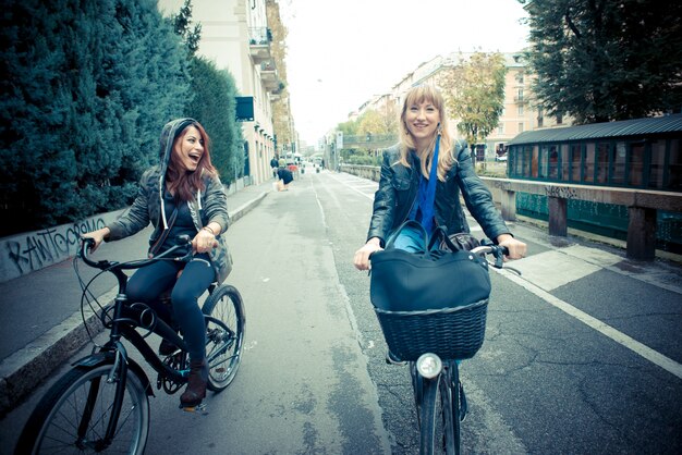 two friends woman on bike