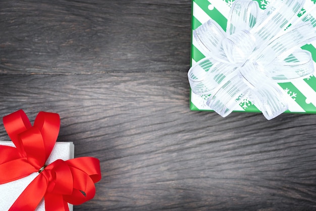 Two gift box on a wooden