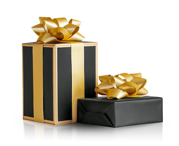 two gift boxes in black packaging with a gold bow isolated on a white background.