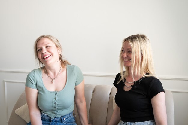 Two girlfriends laugh. Happy women.