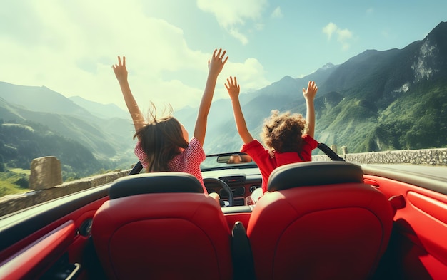 Two girls in a car with their hands up driving at summer