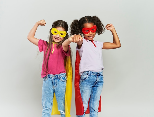 Two girls in superhero costume