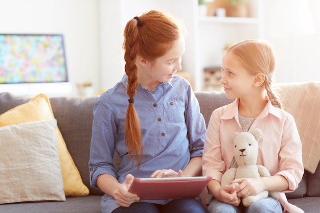 Two Girls Using Internet