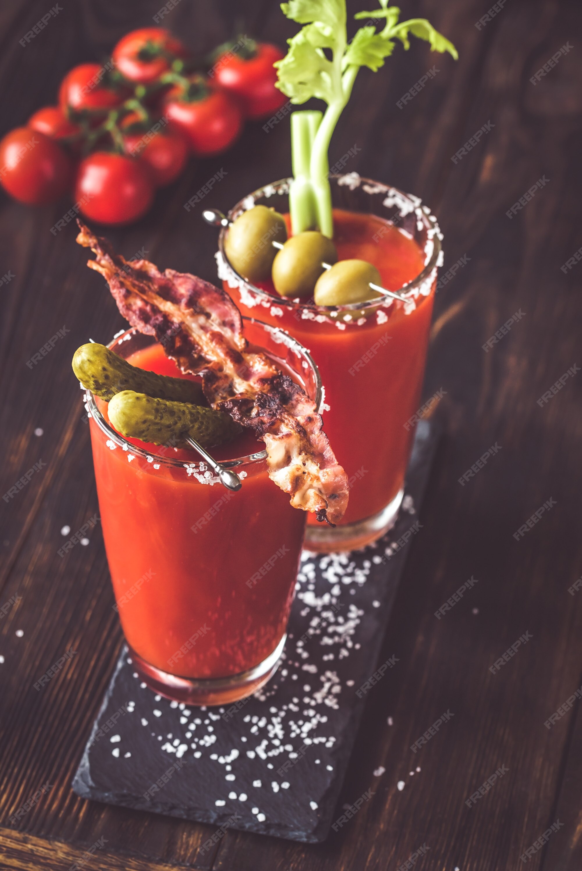 Two glasses of Bloody Mary with bacon rashers Stock Photo by Alex9500