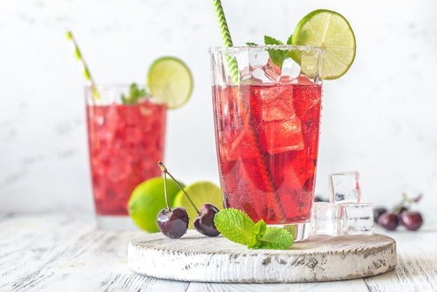 Two glasses of cherry mojito