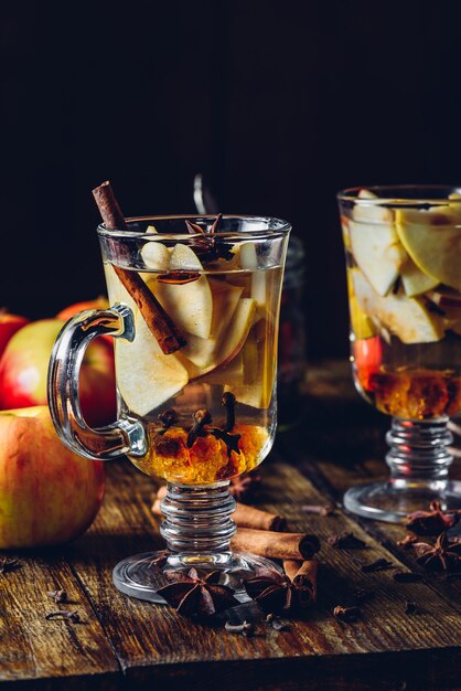 Two Glasses of Christmas Mulled Wine with Sliced Apple