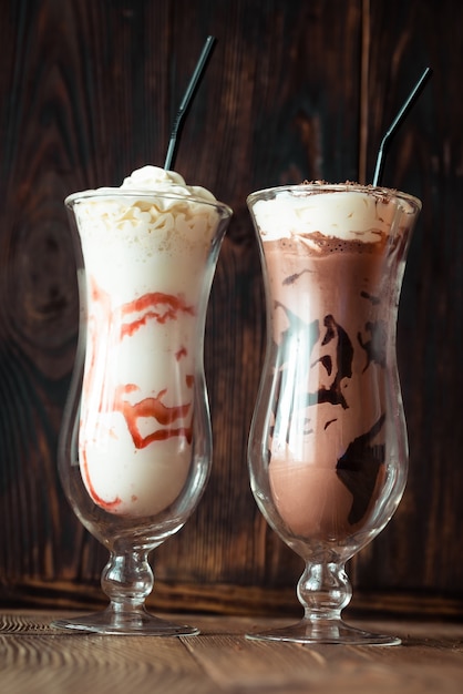 Two glasses of milkshake