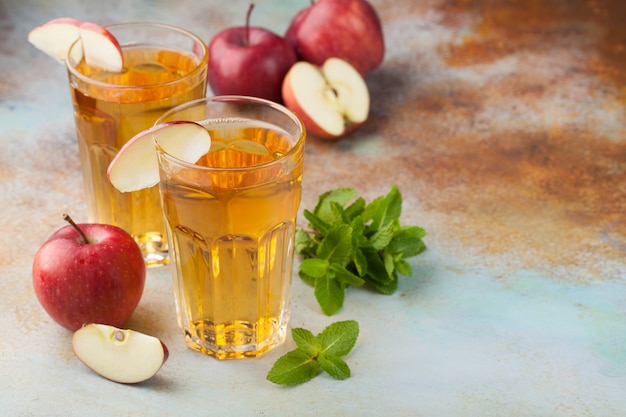 Photo two glasses of red apple juice.