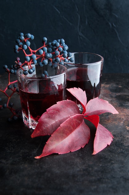 Two glasses of red drink 