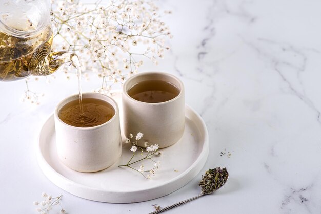 two glasses of tea on the table