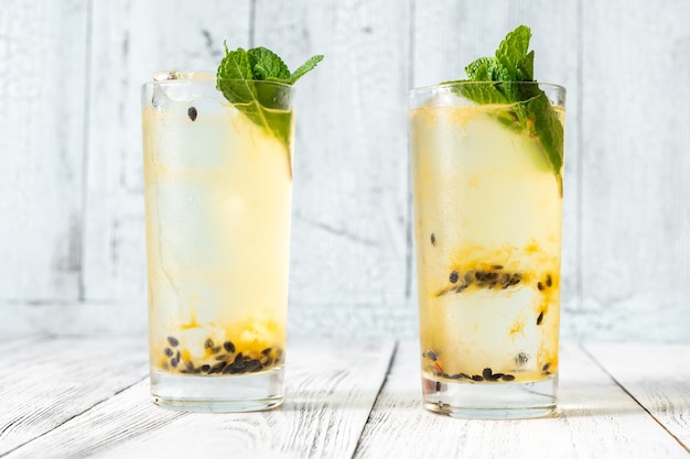 Two glasses of Waltzing Matilda Cocktail decorated with fresh mint sprigs