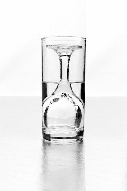 Two glasses on a white background