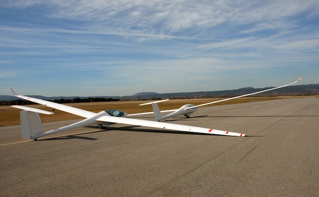 Two gliders at an airport