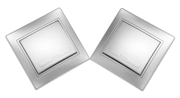 Фото Два серых переключателя света, изолированные на белом фоне