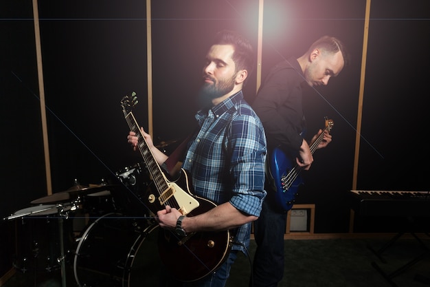 Two guitarists playing