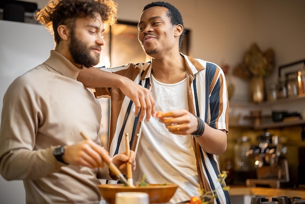 Two guys cooking healthy together at home