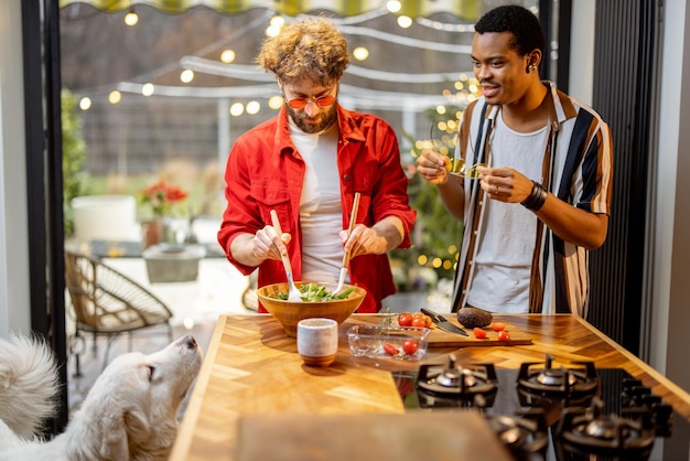 Two guys cooking healthy together at home