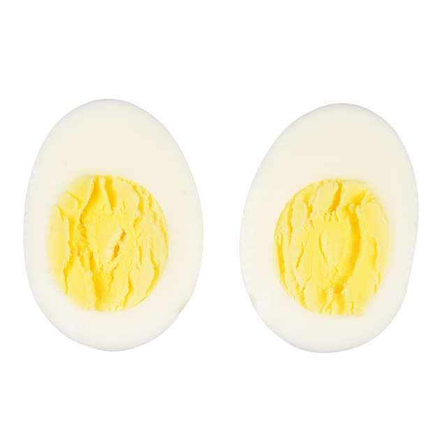 Two halves of a boiled egg on white background