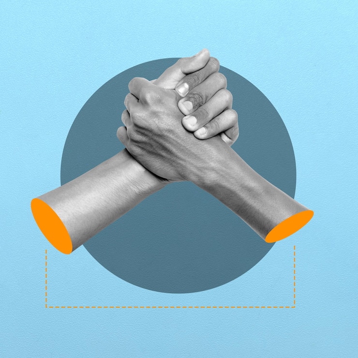 Photo two hands clasped together in a circle