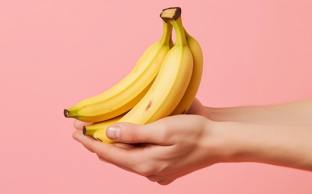 two hands holding a banana