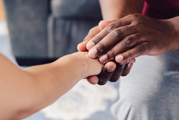 Two hands man and woman showing act of support togetherness or kindness