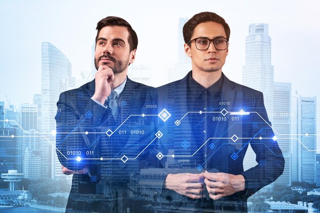 Two handsome businessman pondering about technology as a\
business necessity for tremendous growth in commerce worldwide\
process to conduct transactions tech hologram icons over singapore\
background