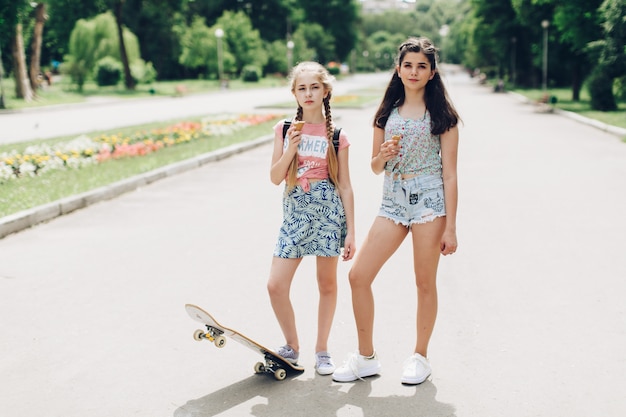 two happy girls modeling