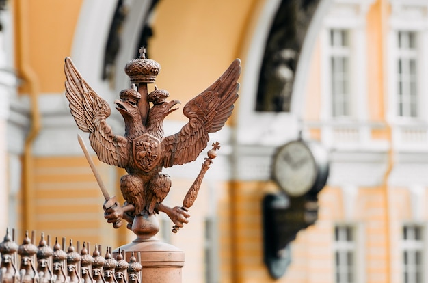 Two-headed eagles on the fence around the pillar of Alexandria, on Palace Square In St. Petersburg.