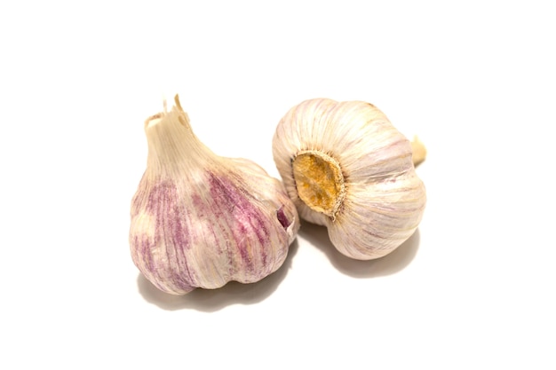 Two heads of garlic. Isolated on white background. High quality photo