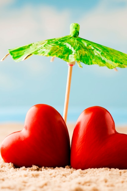 Two hearts on the beach. Honeymoon on summer