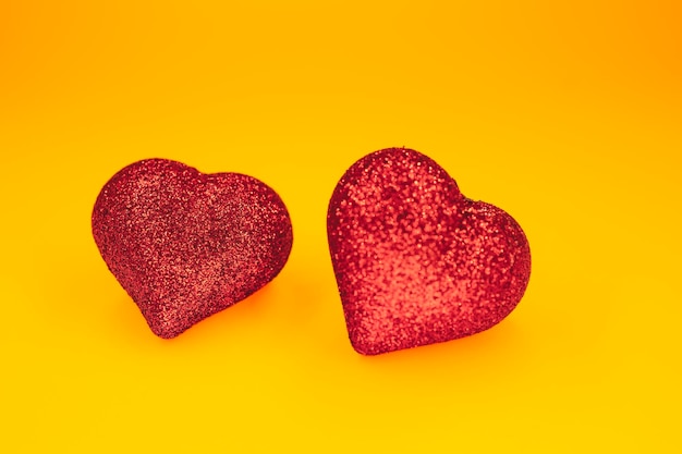 Two hearts shape on the yellow background