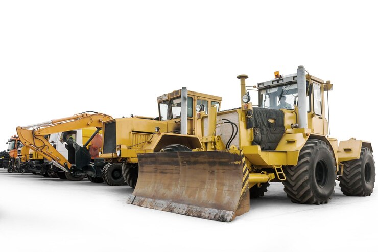 Photo two heavy wheeled tractor one excavator and other construction machinery isolated on white background