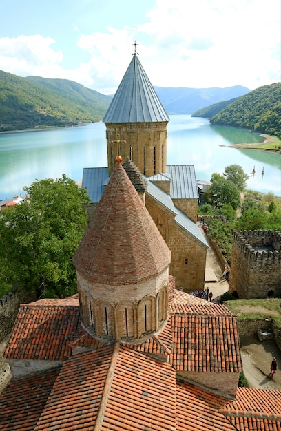 Two historic churches on the Aragvi river bank inside Ananuri fortification, Georgia