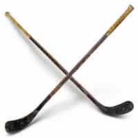 Photo two hockey sticks with the word  v  on the front