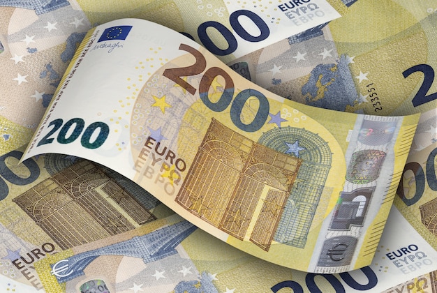 two hundred euro banknote on the background of other euro bills