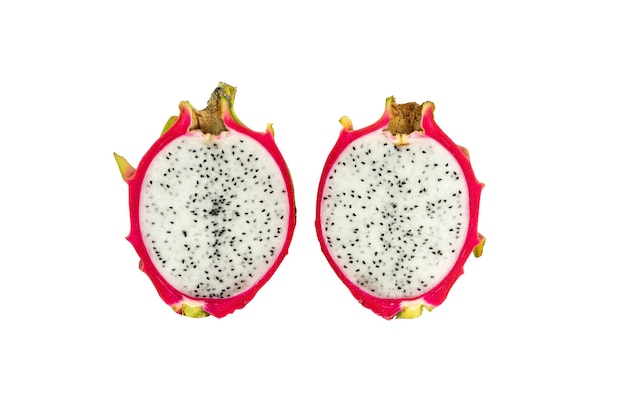 Two isolated halves of red dragon fruit or pitaya lying on a white background