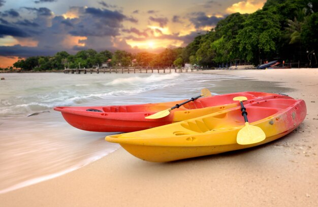 Two kayaks on the beach of the island