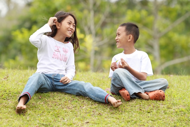 Two kids outdoor having a chat