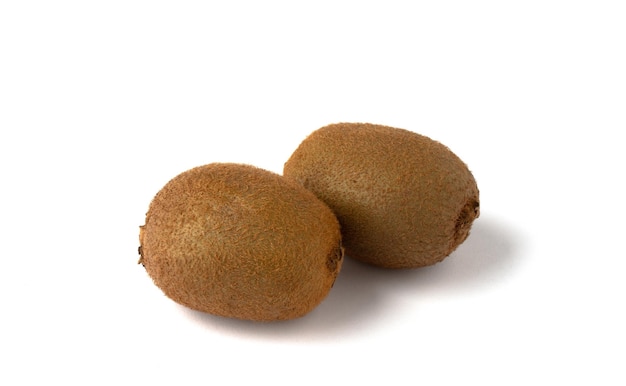 Two kiwi fruits on a white background